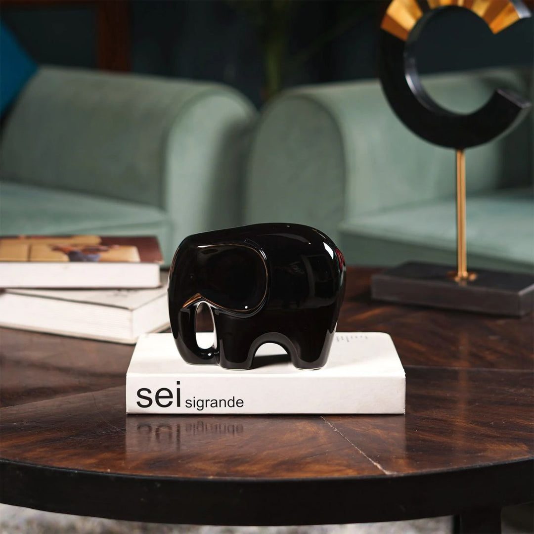 Glossy Guardian black and gold decor elephant by The Artment