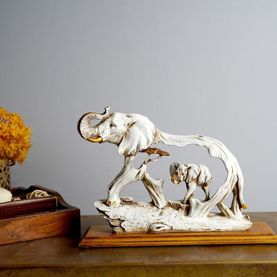 The Feng Shui Golden Elephant Showpiece with Wooden Base - The Artment