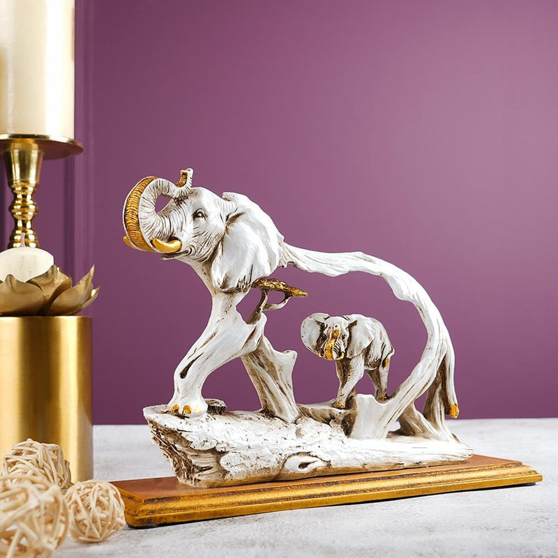 The Feng Shui Golden Elephant Showpiece with Wooden Base - The Artment